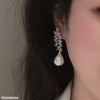 Tear Pearl Drop Earrings